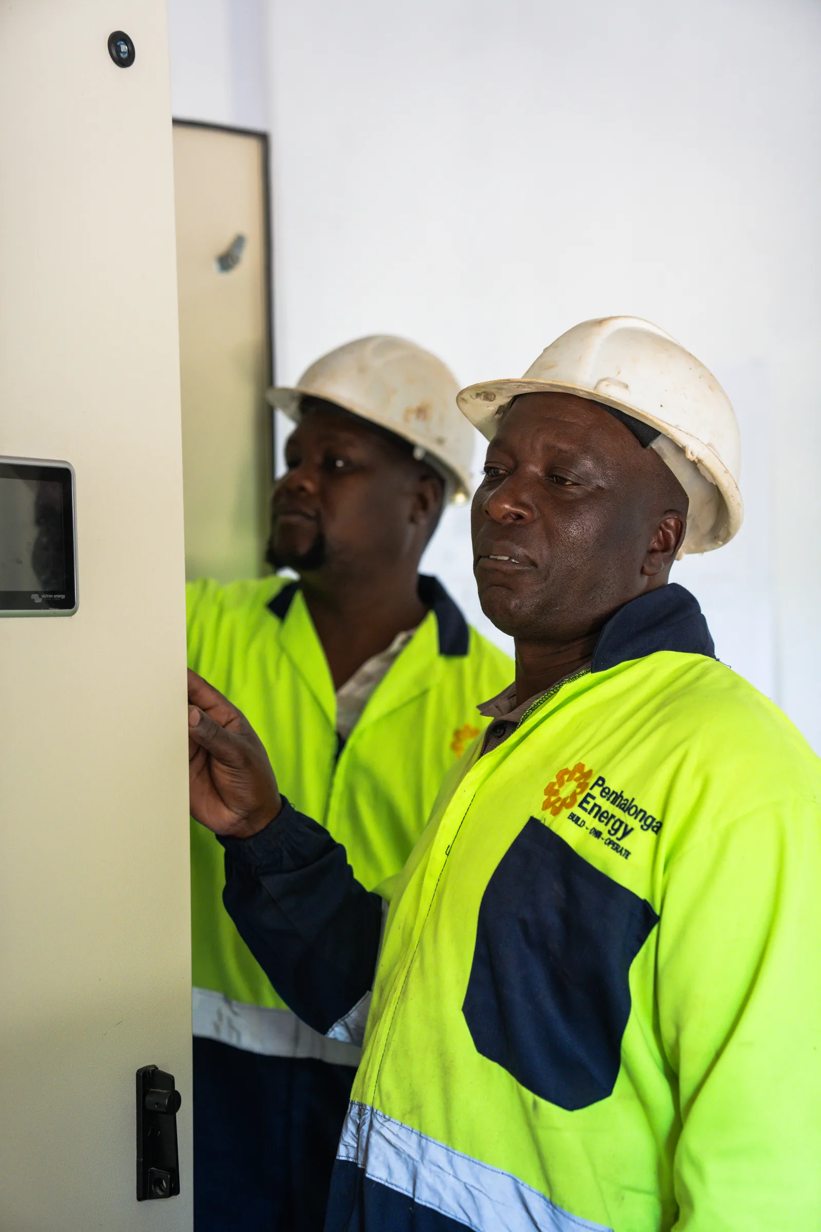 Penhalonga Energy crew on site in branded hi-vis