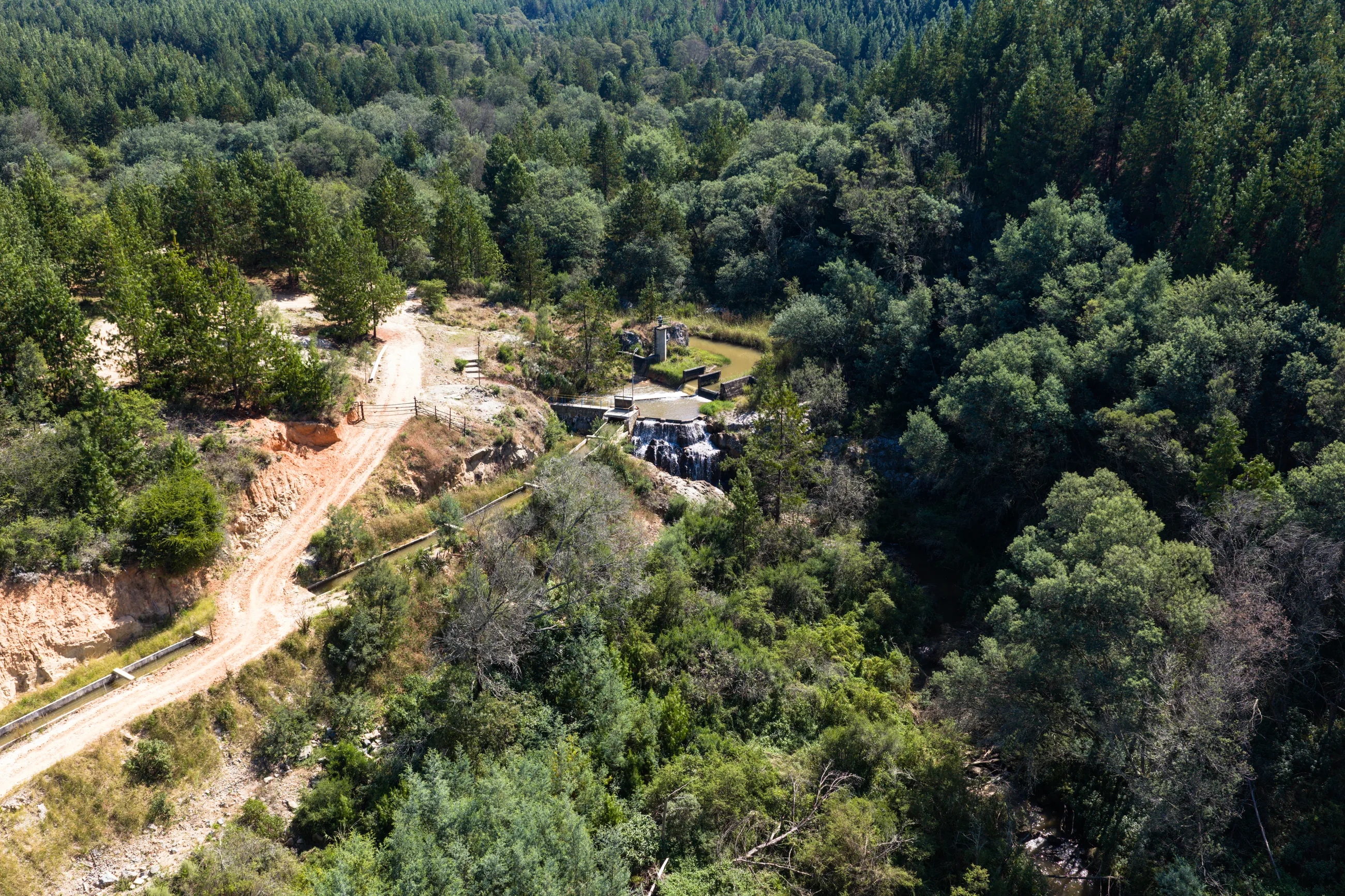 A Penhalonga Energy run-of-river hydro station nestled in the forested valleys of Zimbabwe's Eastern Highlands